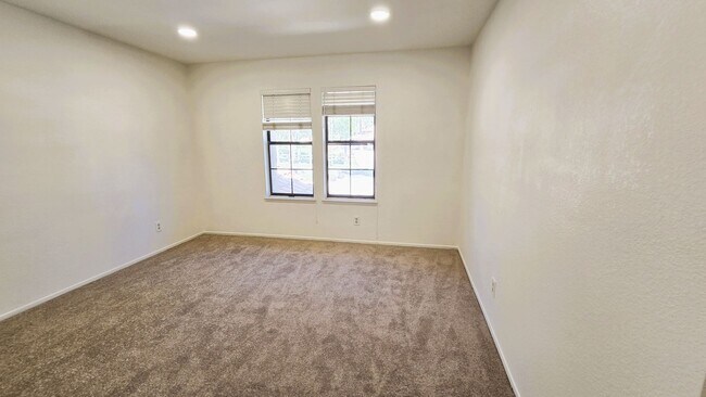 Building Photo - "Spacious, Sunlit Home in a Peaceful Ranch...