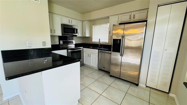 Building Photo - 4415 Pinebark Ave