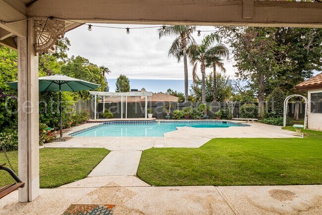 Building Photo - 4 Bedroom/2.5 Bath Home with Paid Solar and a Pool - $2950 Per Month!