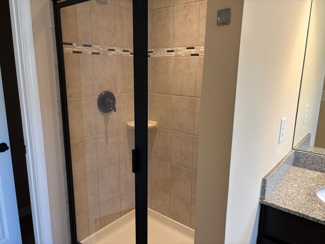 Building Photo - Beautiful End Unit Townhome in the McCarle...