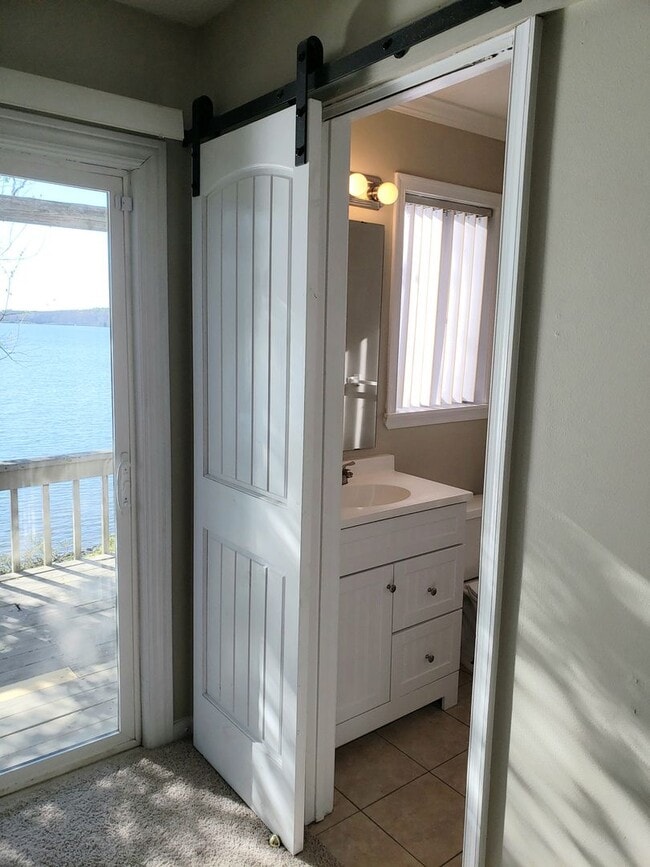 Building Photo - Enjoy Lakefront Luxury Year Round!