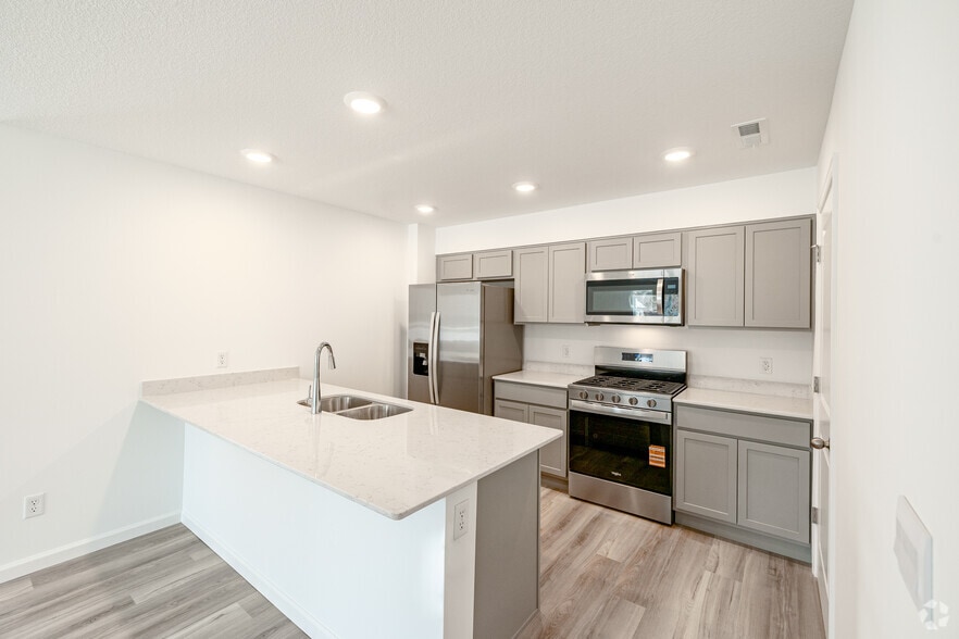 3BR, 2BA - 1,498SF - Unit B - Kitchen - Thunderhawk Villas