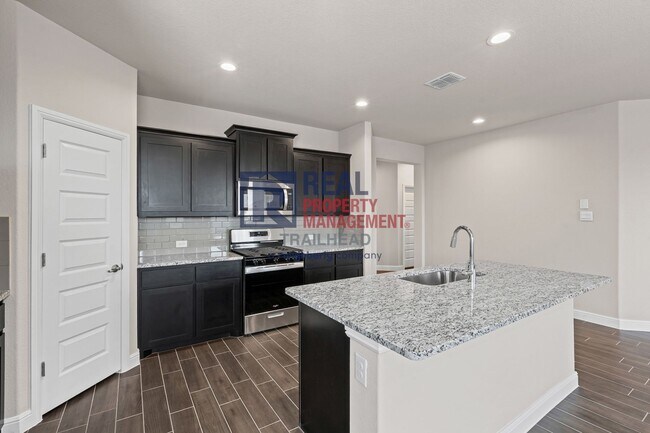 Building Photo - Charming 4-Bed / 2-Bath New Home — Spaciou...