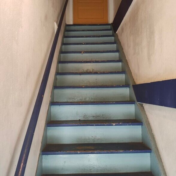 Stairs into Apartment - 116 S Main St