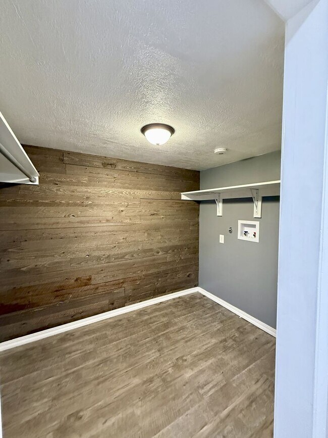 Building Photo - Spacious Comfort Meets Practical Living in...