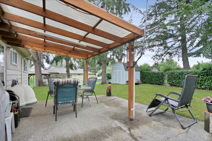 Covered patio and shed. - 7017 Sacramento St SW