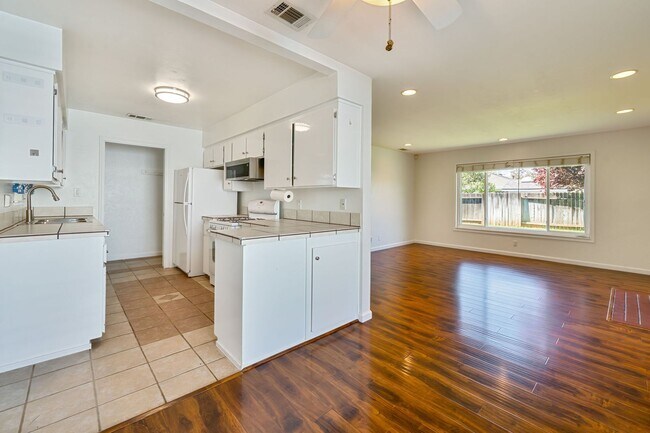 Building Photo - 3BR + Office Home in Excellent Condition with Storage Sheds and Garage Workspace!