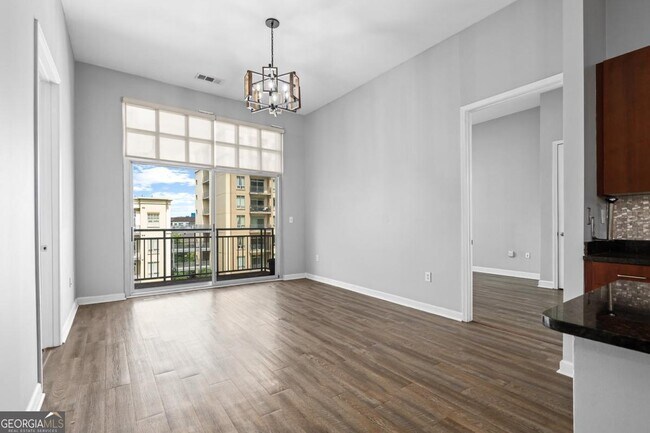 Building Photo - 711 Cosmopolitan Dr NE
