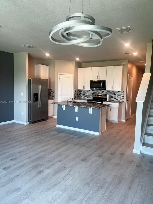 Building Photo - 6349 Topsail Dr