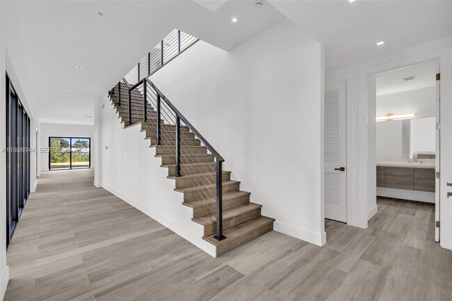 Building Photo - 16699 Botaniko Dr N