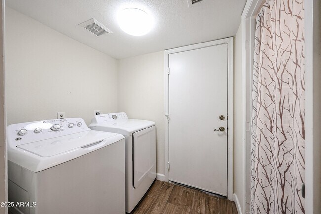 Building Photo - 9085 E Windrose Dr