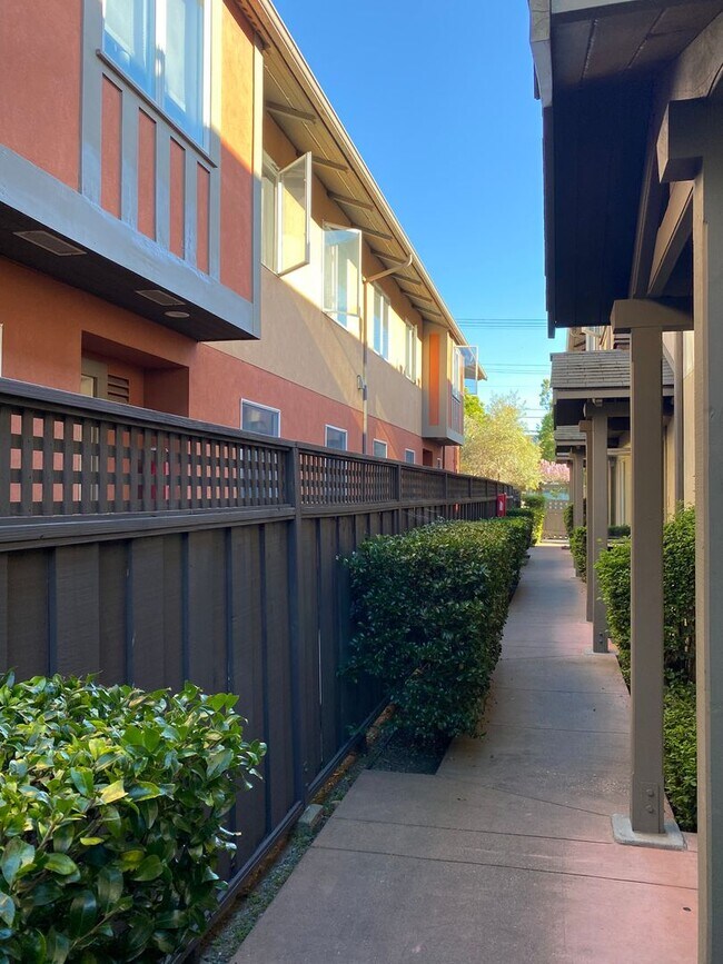 Building Photo - WHAT’S SPECIAL COMFORTABLE SHARED SPACE BRIGHT OPEN-CONCEPT LAYOUT DINING AREA SPACIOUS TOWNHOUSE...