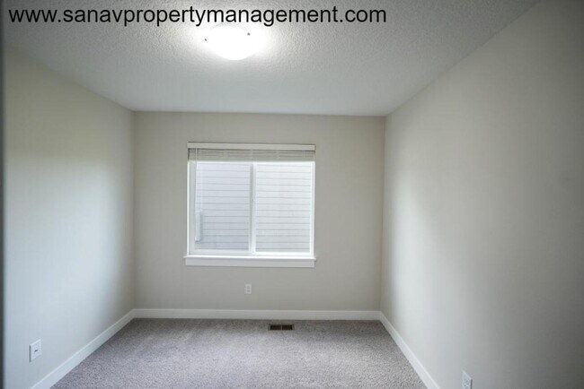 Building Photo - "Modern Comfort Meets Convenience: Your Ideal Home in Waukee"