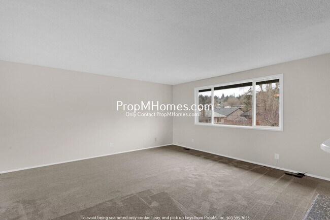 Building Photo - Updated Four Bedroom Home w/ Huge Yard!