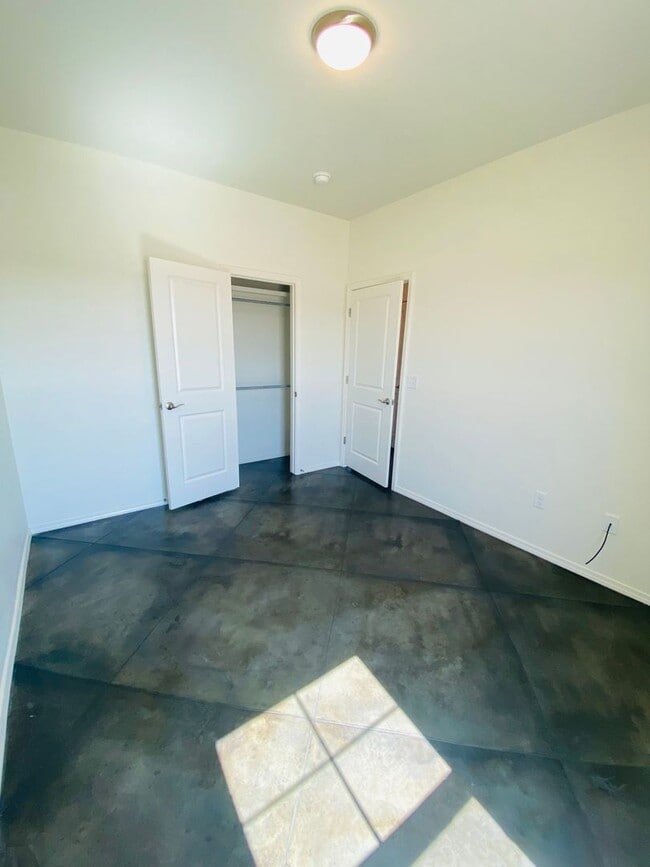 Building Photo - Stunning New 3/2 Townhomes