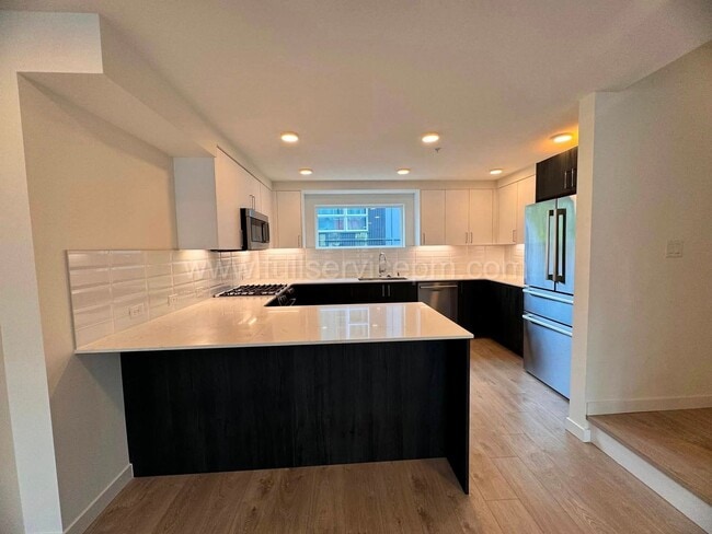Building Photo - Modern Live/Work Northgate Townhome w/ Rooftop Deck, Luxury Bosch Kitchen & Dual Suites