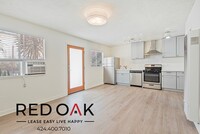 Building Photo - Breathtaking One Bedroom with Modern Light...