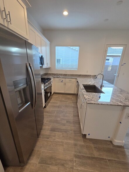 Building Photo - 23104 E Roundup Way