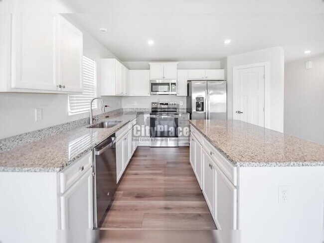 Building Photo - 7009 E Bean Blossom Dr