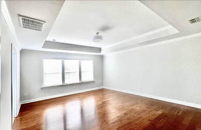 Building Photo - "Charming 3-Bed End-Unit Townhome Retreat ...