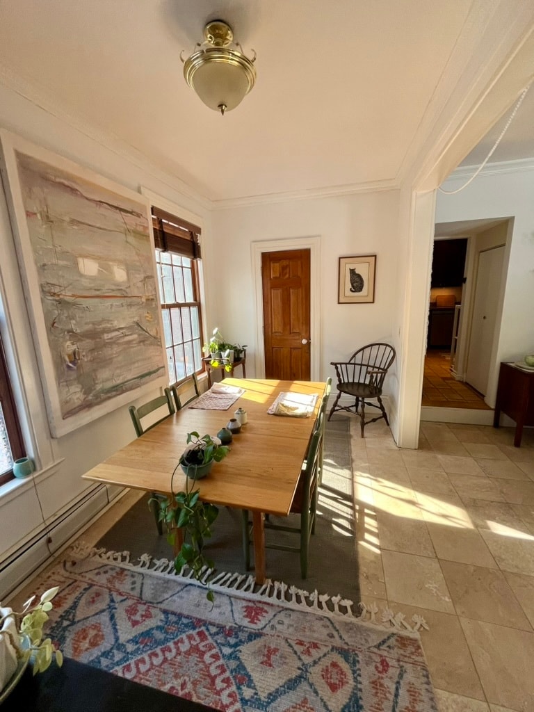 Dining room and door to half bath - 87 Park St