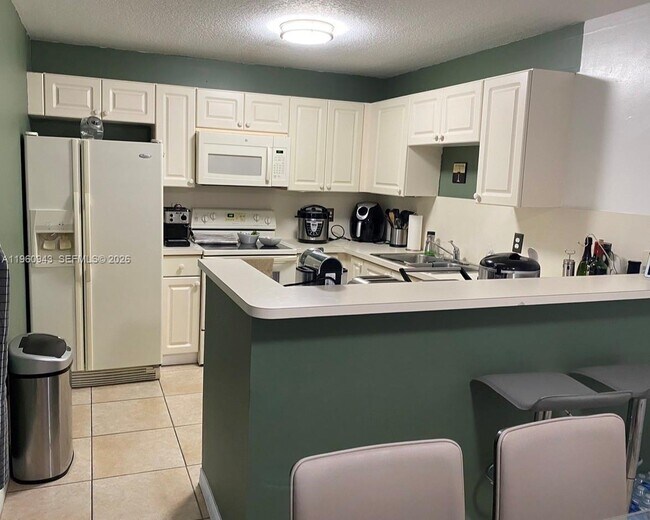 Building Photo - 7245 NW 173rd Dr