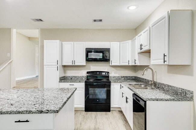 Building Photo - Recently Renovated 4-Bedroom Home with Mod...