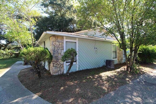 Building Photo - 6810 Tiki Ln