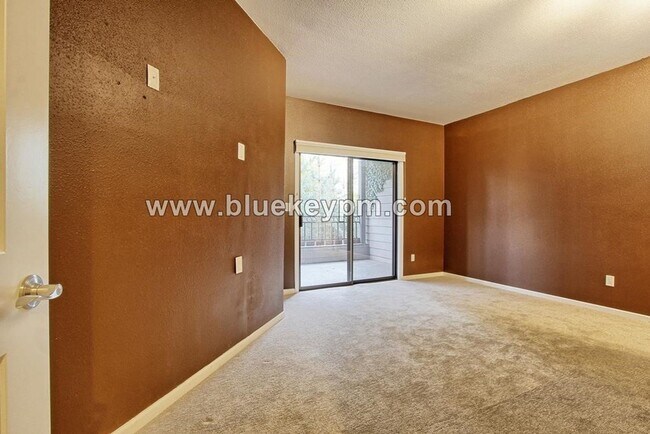 Building Photo - 2 Bed, 2 Bath Condo with Roof Top Patio, Covered Balcony and Secure Garage