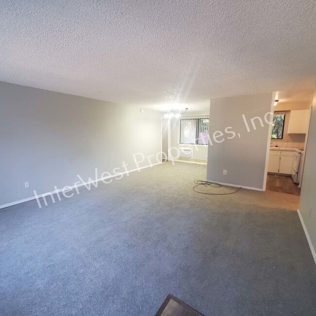 Building Photo - Beautiful Ranch Style Home on Very Large Corner Lot With W/D Hookups, Fireplace, 2 Car Garage & A...