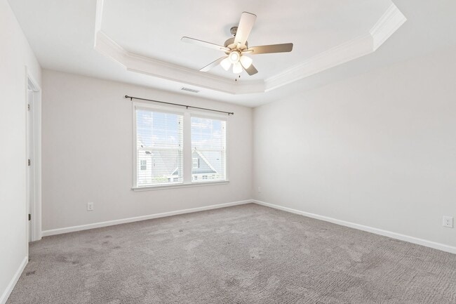 Building Photo - Stylish 4-Bedroom Townhome with Backyard O...