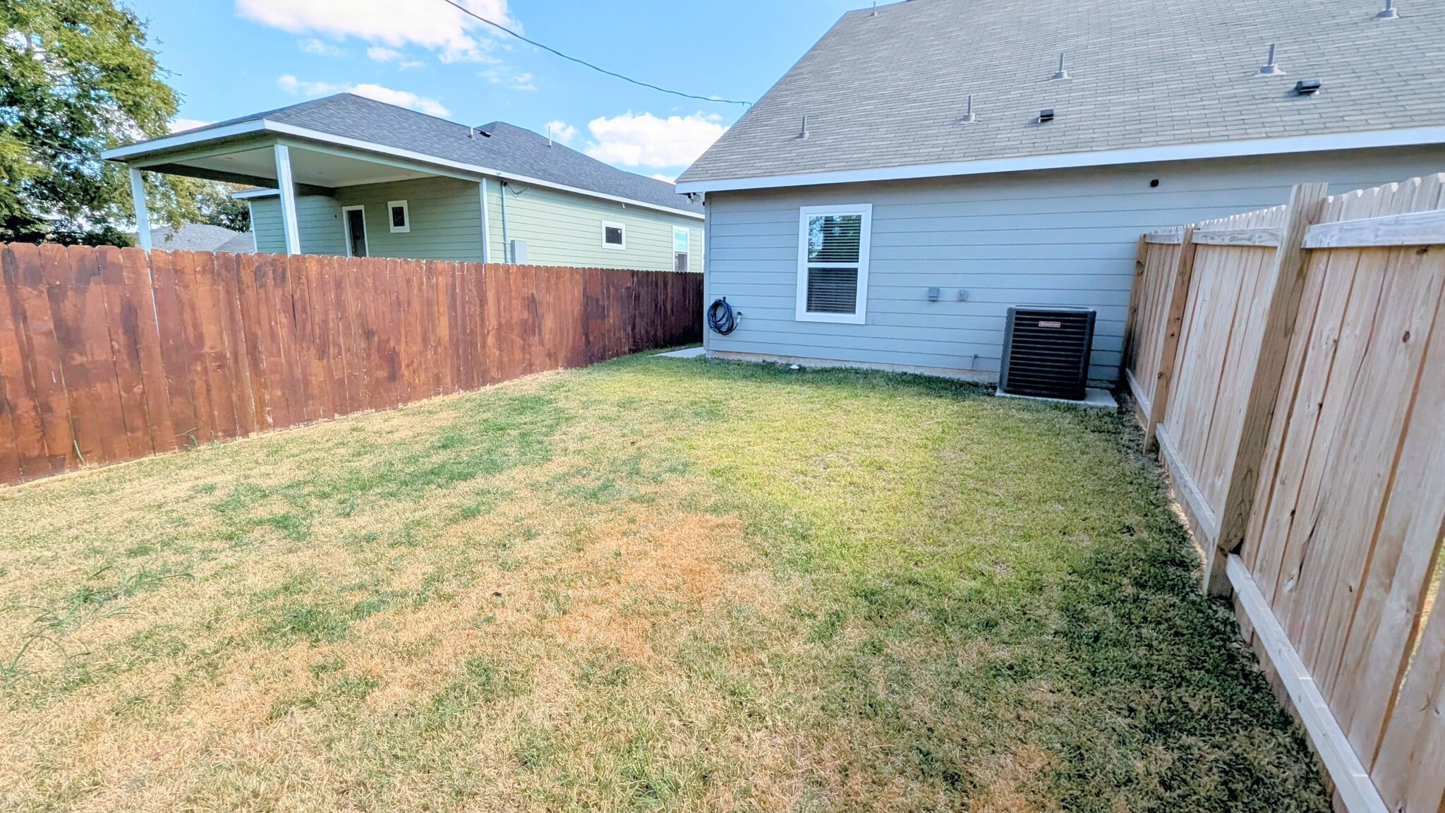 Beautiful grassy space for play or relaxing. - 13218 HP Johnson St