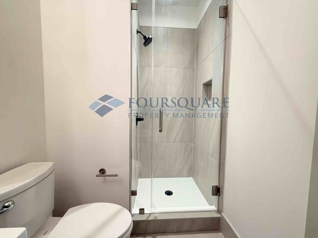 Building Photo - Modern 4-Bed / 4-Bath Townhome with Covered Patio, Deck & Garage – Inside the Beltline Near Downt...