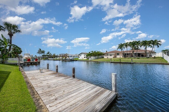 Primary Photo - Enjoy the pool or fish/kayak/boat from the...