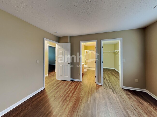 Building Photo - 6312 Satin Wood Dr