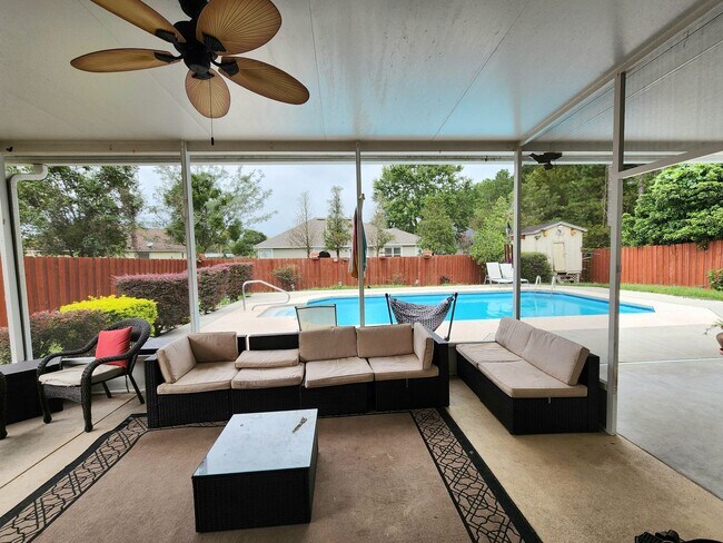 Building Photo - 4 Bedroom 2.5 Bath with in ground pool located in Lake Asbury