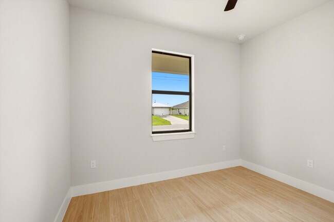 Building Photo - New Construction 3/2 Pool Home on Canal, $2,699, NW Cape Coral. The Only Thing Used Here Is the W...