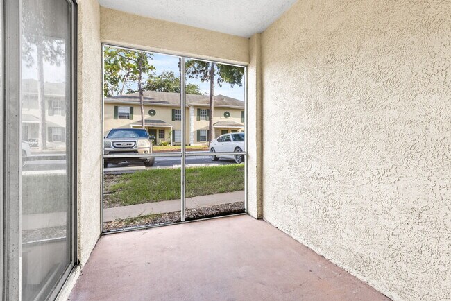 One of two screened patios - 5009 Sunridge Palms Dr