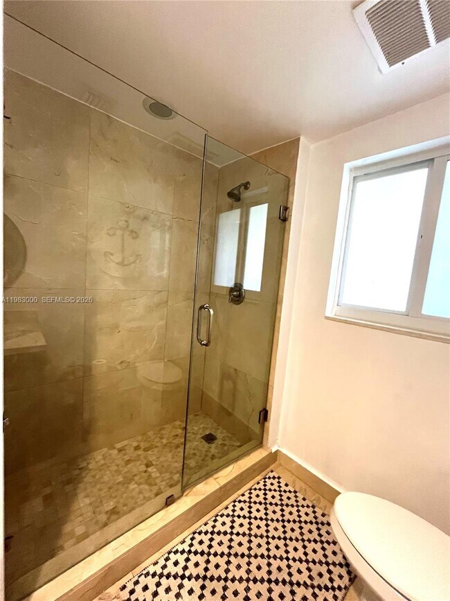 Building Photo - 10190 Collins Ave