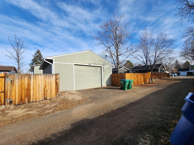 Building Photo - Shop-Ready 4BR Home with Lift-Ready Detached Garage & RV Parking Near Downtown Firestone