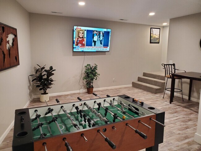 Lower level game room. - 1314 Bogey Trl