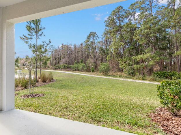 Building Photo - "Estancia 3-Bed Sanctuary with Granite Finishes and Scenic Views in Wesley Chapel"