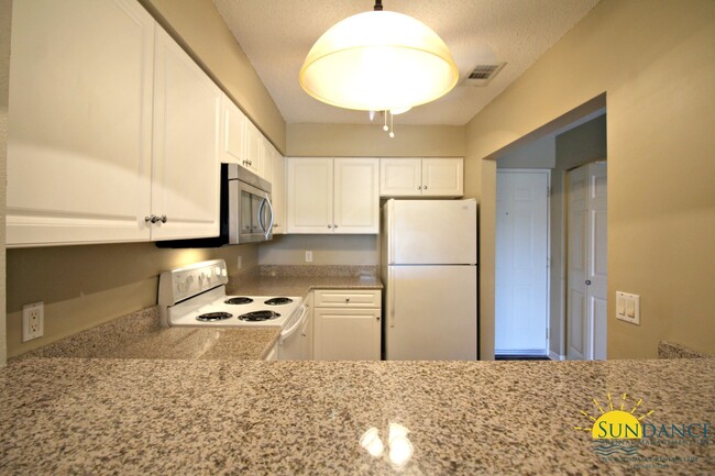 Building Photo - Pool view 2 Bedroom Unit at The Florida Cl...
