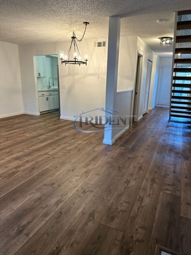 Building Photo - 3 bedroom, 2 ½ bath townhouse, located in The Grove gated community