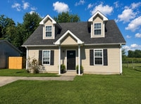 Building Photo - Just listed with upstairs bedrooms!