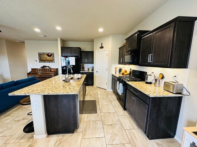 Building Photo - STUNNING Back yard!  Level II EV Charger!