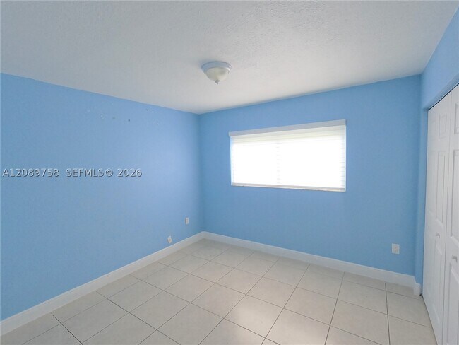 Building Photo - 9911 W Okeechobee Rd