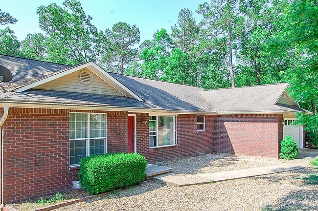 Building Photo - This beautiful home is located in a quiet private neighborhood and perfect for a serene living at...