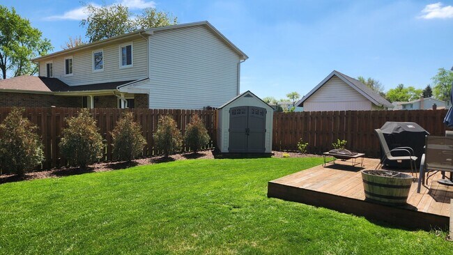 Building Photo - Charming 4BR House in Woodridge