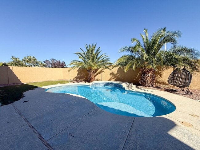 Building Photo - SPACIOUS HOME IN GATED COMMUNITY WITH POOL, RV PARKING & 4-CAR GARAGE!